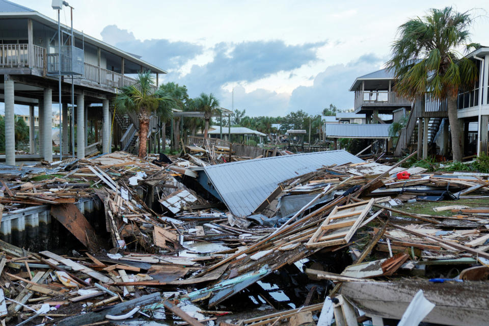 A large amount of debris piled up in a canal.