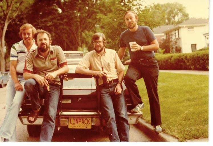 Jack Dongarra, far left, poses with the co-authors of the LINPACK software package on Dongarra's car in the suburbs of Chicago in 1979. Dongarra got a LINPACK license plate to celebrate.