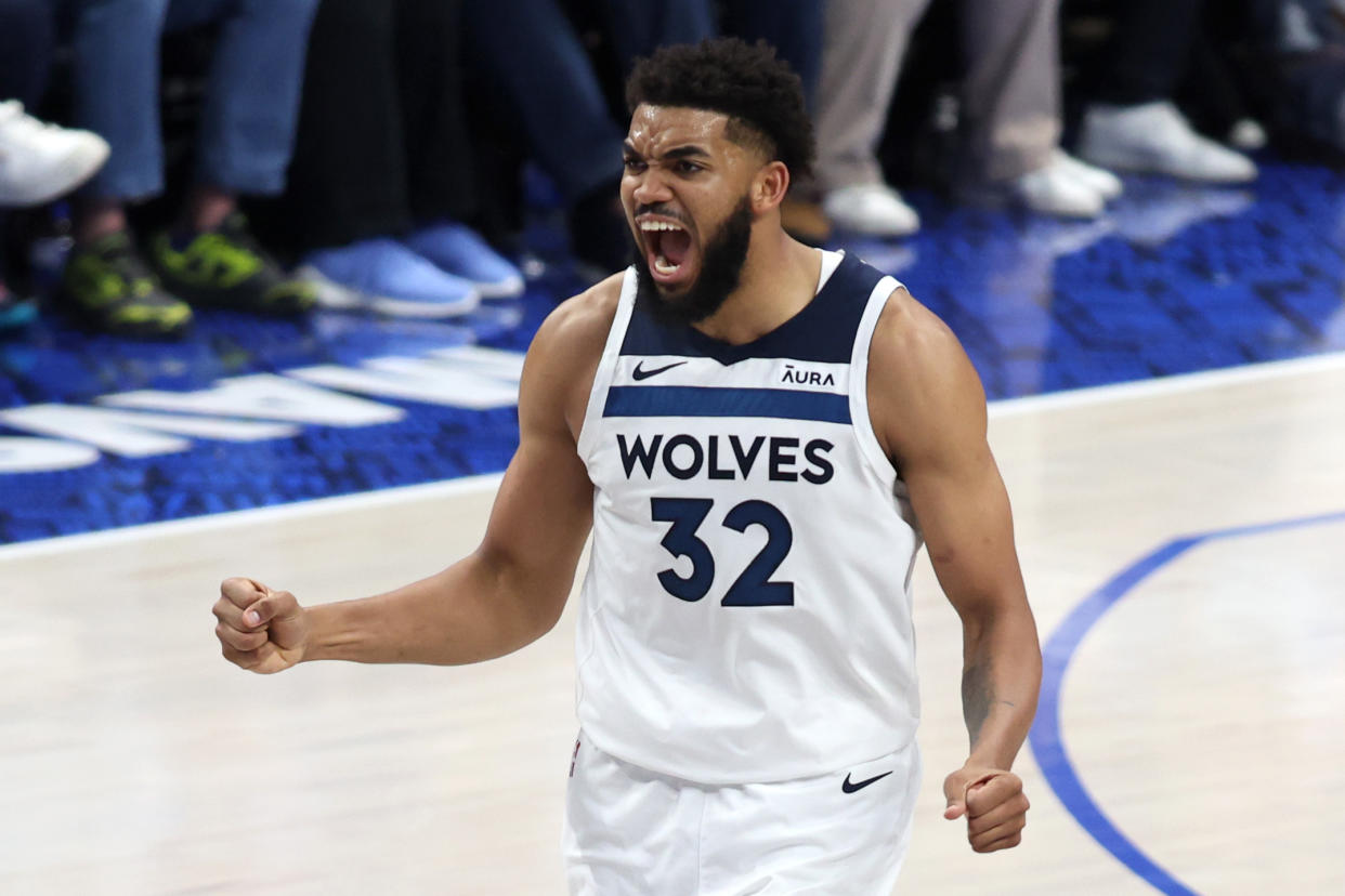 DALLAS, TEXAS - MAY 28:  Karl-Anthony Towns #32 of the Minnesota Timberwolves celebrates a basket during the second half against the Dallas Mavericks in Game Four of the Western Conference Finals at American Airlines Center on May 28, 2024 in Dallas, Texas. NOTE TO USER: User expressly acknowledges and agrees that, by downloading and or using this photograph, User is consenting to the terms and conditions of the Getty Images License Agreement. (Photo by Tim Heitman/Getty Images)