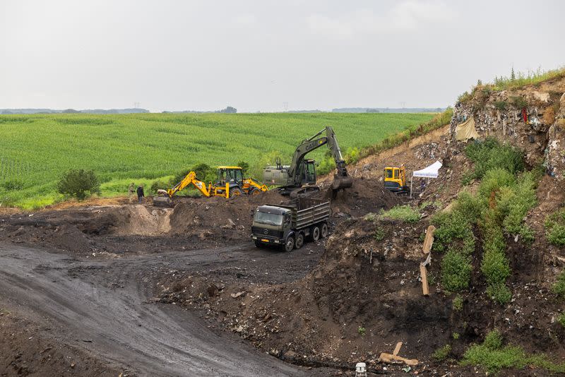 Military is seen digging at Petrovacka dola garbage yard where a new mass grave was found from the Croatian War of Independence in Vukovar