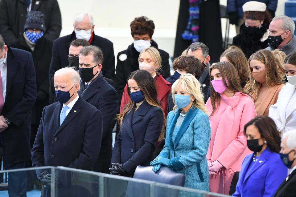 President-elect Joe Biden and First Lady Jill Biden stand with members of the Biden family during the 2021 Presidential Inauguration.