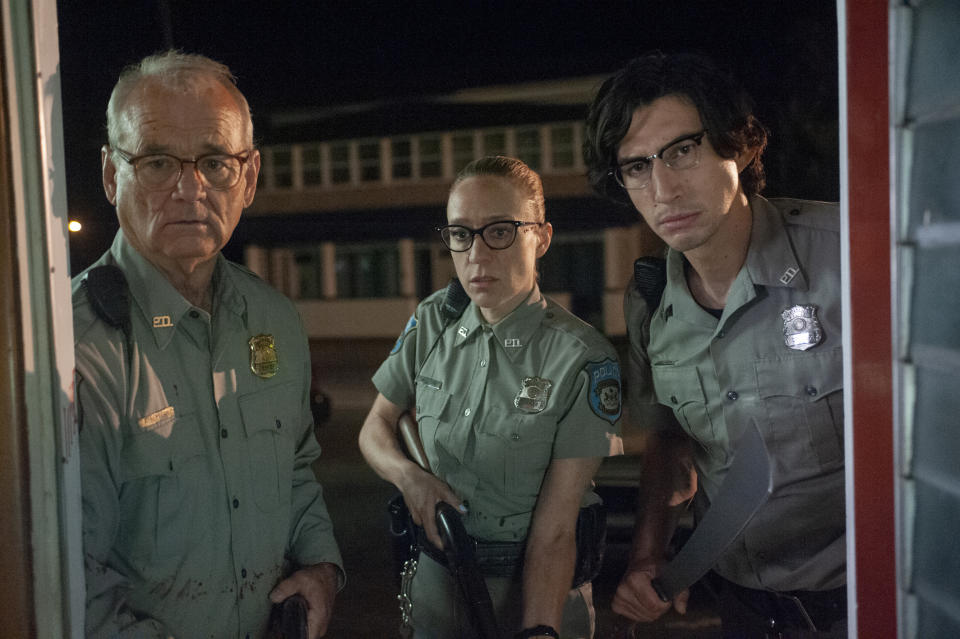 This undated image provided by Focus Features from left to right, shows Bill Murray, Chloë Sevigny and Adam Driver in a scene from writer/director Jim Jarmusch's "The Dead Don’t Die." (Abbot Genser/Image Eleven Productions, Inc./Focus Features via AP)