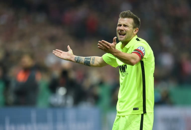 Augsburg's midfielder Daniel Baier reacts during their match against Bayern Munich on October 26, 2016