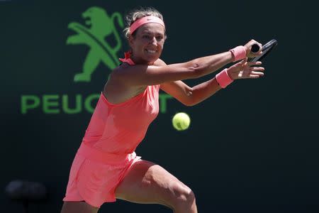 Mar 29, 2018; Key Biscayne, FL, USA; Victoria Azarenka of Belarus reaches for a backhand against Sloane Stephens of the United States (not pictured) in a women's singles semi-final of the Miami Open at Tennis Center at Crandon Park. Mandatory Credit: Geoff Burke-USA TODAY Sports