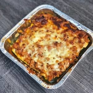 Zucchini Lasagna With Ground Beef in a pan