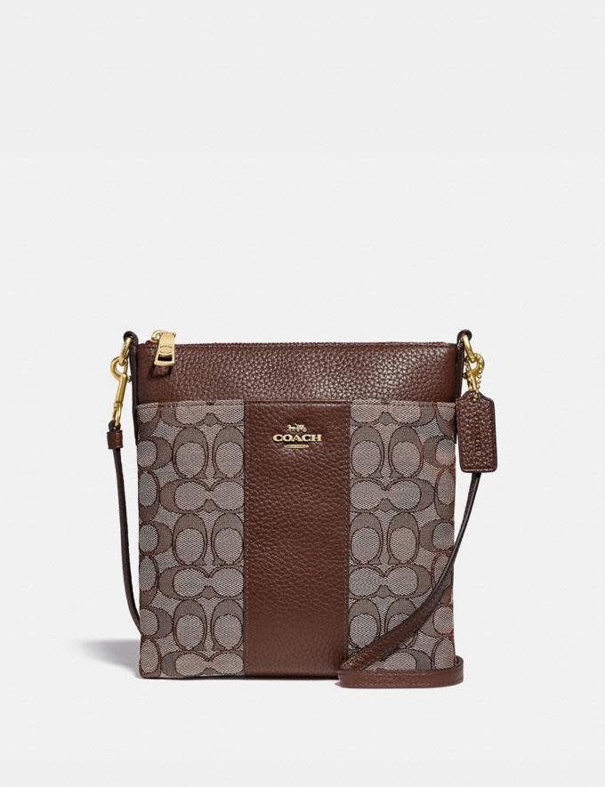 Kitt Messenger Crossbody In Signature Jacquard (Photo via Coach)