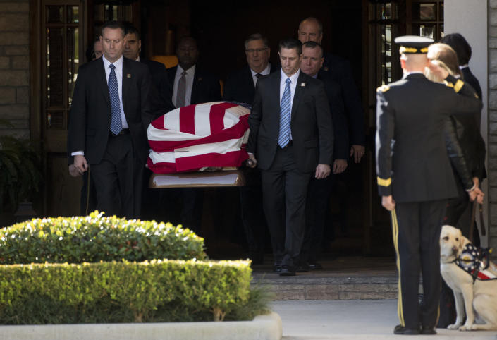 Pallbearers carry president George H.W. Bush’s casket out of the George H. Lewis and Sons Funeral Home during the first departure ceremony for the State Funeral Monday, Dec. 3, 2018, in Houston. ( Photo: Godofredo A. Vasquez / Houston Chronicle via AP)