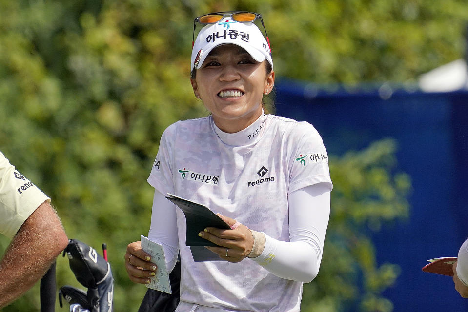 Lydia Ko of New Zealand shares a laugh while waiting on the eighth tee-box during the third round of the Dana Classic LPGA golf tournament Saturday, Sept. 3, 2022, at the Highland Meadows Golf Club in Sylvania, Ohio. (AP Photo/Gene J. Puskar)