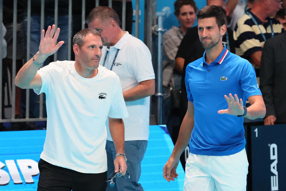 Jonathan Elrich and Novak Djokovic, pictured here addressing the crowd at the Tel Aviv Open.