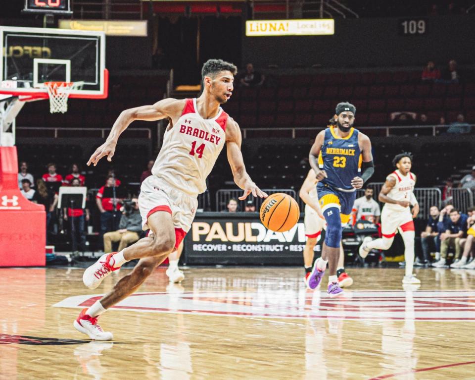 Malevy Leons runs the floor on the way to a career-high 32 points during the Braves 83-41 blowout win over Merrimack at Carver Arena on Saturday, Nov. 26, 2022.