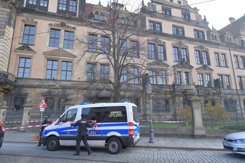 A police car parks outside Green Vault city palace after a robery in Dresden