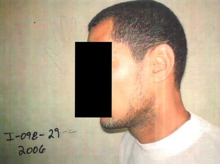 A black strip placed by censors masks the identity of a detainee in an undated photo from Iraq's Abu Ghraib prison, among 198 images released in a Freedom of Information Act (FOIA) lawsuit against the U.S. Department of Defense in Washington, DC February 5, 2016. REUTERS/DoD/Handout via Reuters