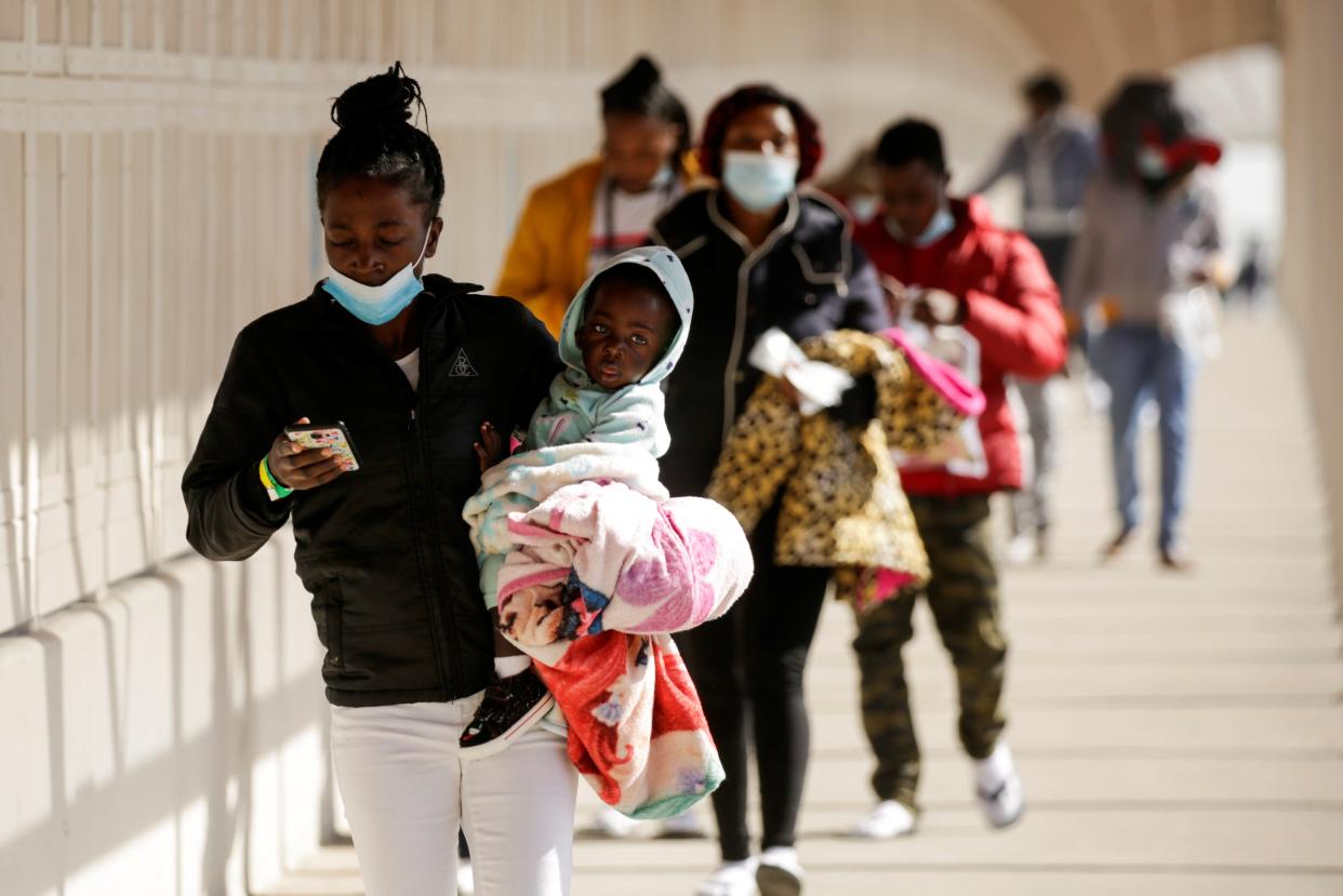 <p>Migrants from Haiti walk across the Zaragoza-Ysleta international border bridge after being deported from the United States, in Ciudad Juarez, Mexico.</p> (REUTERS)