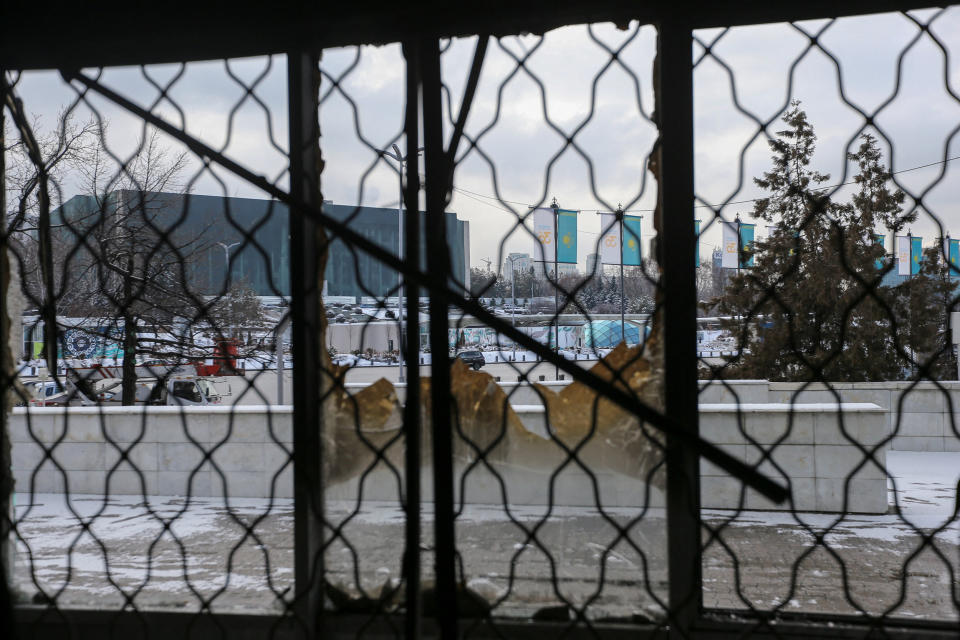 Image: A view shows the burnt office of Mir TV channel in Almaty (Pavel Mikheyev / Reuters)