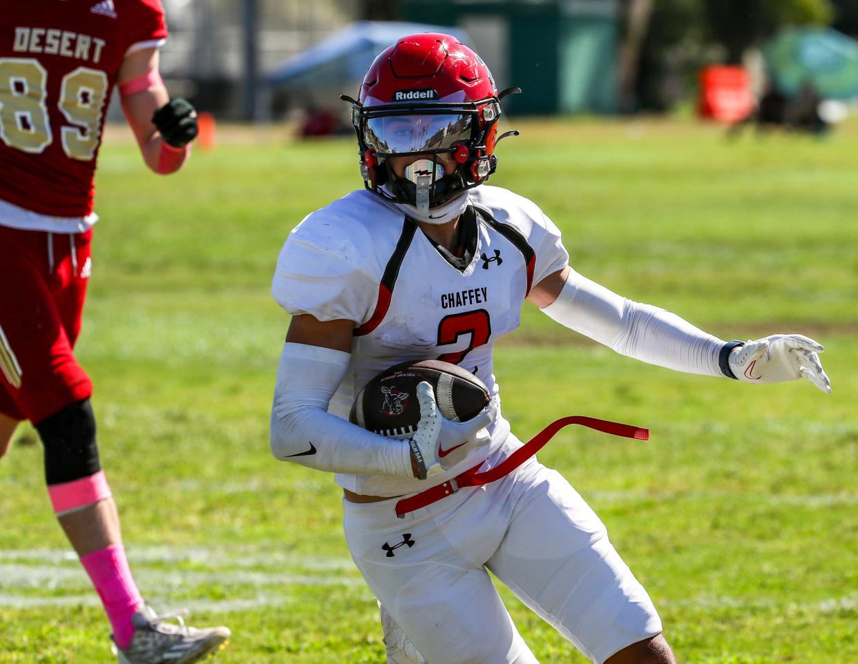 Chaffey's Corey Cabriales (2) runs the ball after a short pass during the first quarter of their game at College of the Desert in Palm Desert, Calif., Saturday, Oct. 21, 2023.