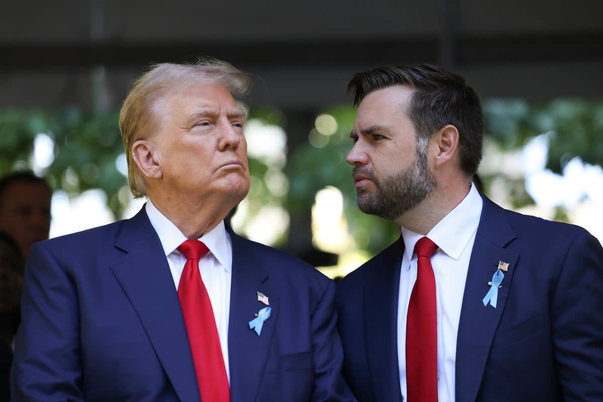 Trump and Vance (seen together at Ground Zero on Wednesday) have pushed the story despite it being debunked ((AP Photo/Yuki Iwamura))