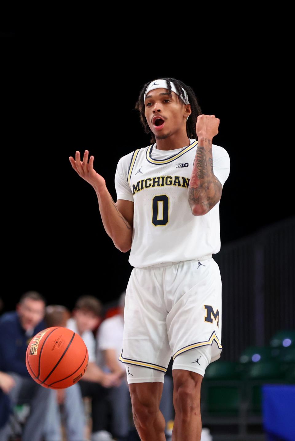 Michigan Wolverines guard Dug McDaniel reacts during the first half against the Stanford Cardinal at Imperial Arena on Paradise Island, Bahamas, on Thursday, Nov. 23, 2023.