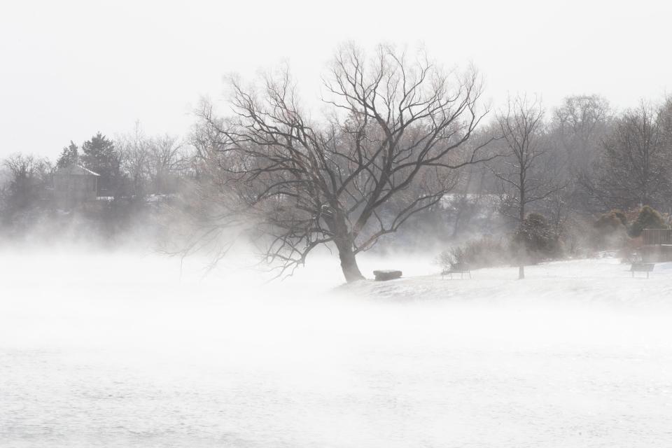 Blowing snow Thursday afternoon obscures the view of Lake Shawnee.