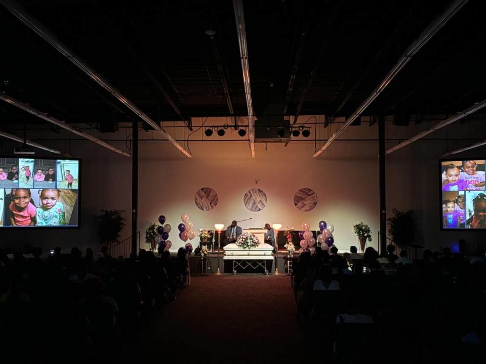 Kourtney Freeman’s casket during a slideshow of her childhood photos.