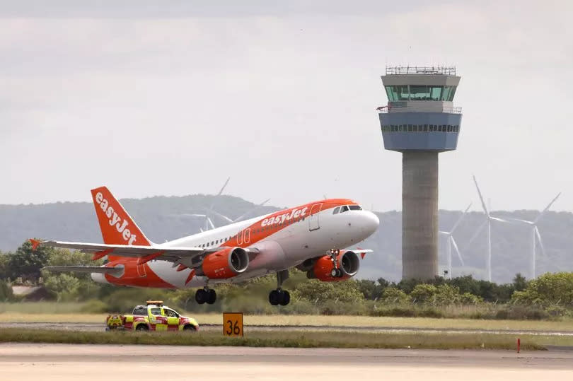 Stock picture of an EasyJet plane taking off at Liverpool John Lennon Airport in Merseyside