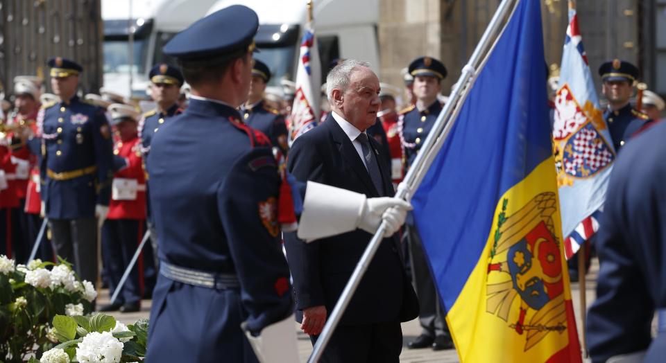 President of Moldova Nicolae Timofti inspects the guard of honor upon his arrival for a meeting on the 5th anniversary of the Eastern Partnership at the Prague Castle in Prague, Czech Republic, Thursday, April 24, 2014. (AP Photo/Petr David Josek)