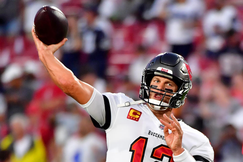 Tom Brady threw a first-quarter TD against the Cowboys. (Photo by Julio Aguilar/Getty Images)