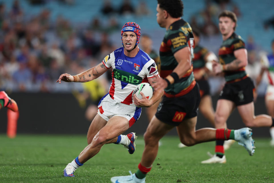 SYDNEY, AUSTRALIA - AUGUST 24:  Kalyn Ponga of the Knights makes a break during the round 25 NRL match between South Sydney Rabbitohs and Newcastle Knights at Accor Stadium, on August 24, 2024, in Sydney, Australia. (Photo by Matt King/Getty Images)