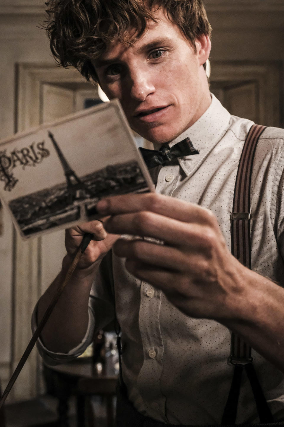 <p>Newt seems intrigued by this correspondence. (Photo: Jaap Buitendijk/Warner Bros.) </p>