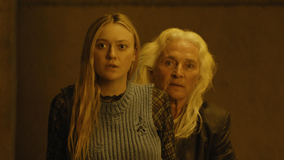 Dakota Fanning and Olwen Fouéré in The Watchers (Warner Bros. Pictures)