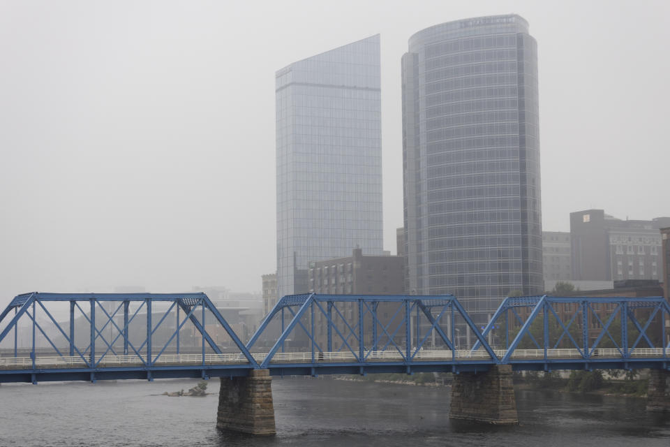 Smoke from wildfires in Canada blankets Grand Rapids, Mich., on Tuesday, June 27, 2023. The smoke is reducing visibility and air quality. (Neil Blake/MLive.com/The Grand Rapids Press via AP)