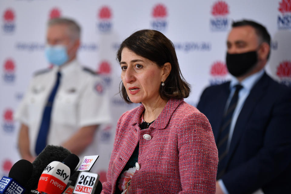 NSW Premier Gladys Berejiklian at the daily Covid press conference wearing a pink jacket. 