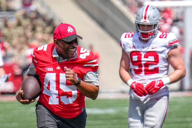 Ohio State football great Archie Griffin runs for a touchdown in the  Buckeyes' spring game 