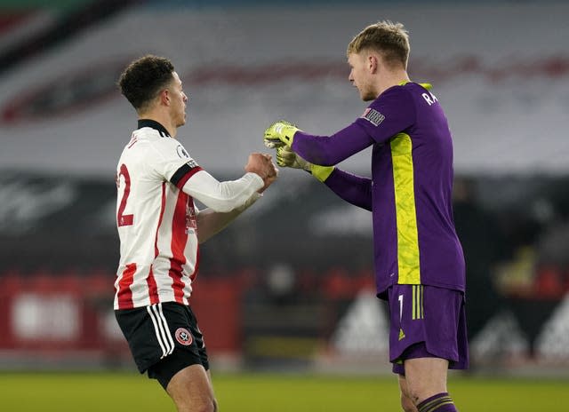 Ethan Ampadu, left, congratulates goalkeeper Aaron Ramsdale