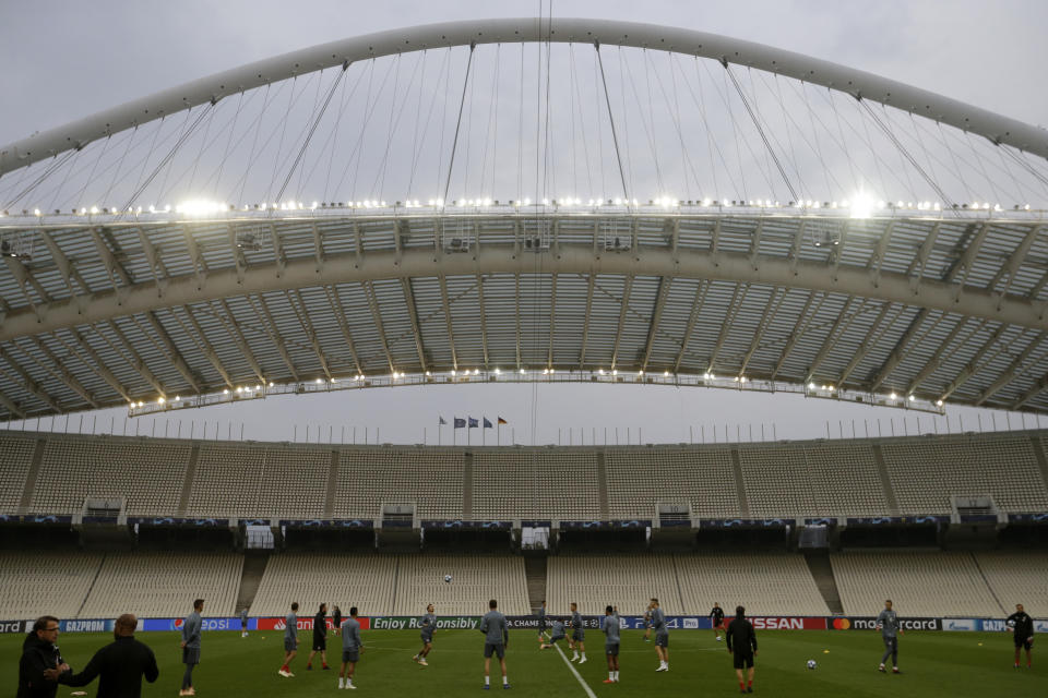 FILE - Bayern players practice during a training session at Olympic Stadium in Athens, Monday, Oct. 22, 2018. Government officials say Monday, Oct. 2, 2023 a new inspection has been ordered at a stadium that hosted the Athens Olympics in 2004 after rust was found along the iconic arched roof, forcing the site to close. The arched roof structures were designed by renowned Spanish architect Santiago Calatrava for the 2004 Athens Olympics. (AP Photo/Thanassis Stavrakis, File)