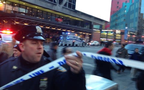 Police respond to a report of an explosion near Times Square on Monday, Dec. 11, 2017, in New York - Credit: AP