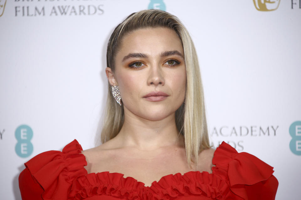 Actress Florence Pugh poses for photographers upon arrival at the Bafta Nominees Party, in central London, Saturday, Feb. 1, 2020. (Photo by Joel C Ryan/Invision/AP)