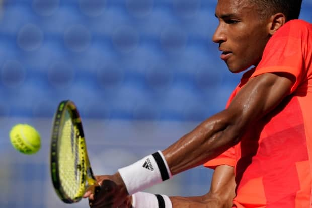 Canadian Felix Auger-Aliassime lost his opening-round Olympic match against Max Purcell, of Australia, on Sunday in Tokyo. ((AP Photo/Seth Wenig) - image credit)