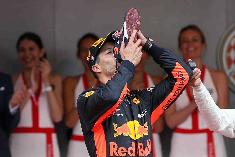 Dan dare: Daniel Ricciardo quaffs champagne from his trusty ‘shoey’ after victory in the 2018 Monaco Grand Prix