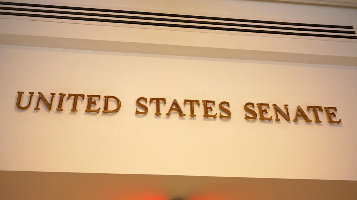 A sign marks an entrance to the United States Senate in the US Capitol building.