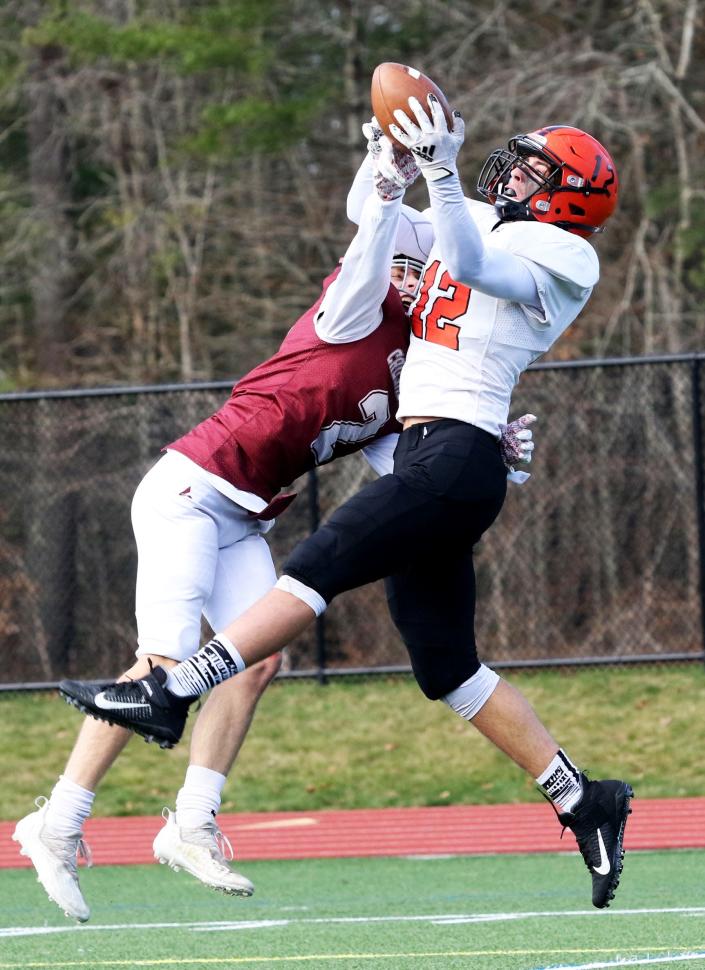 Middleboro&#39;s Cam Downey makes the catch over Carver defender in the endzone during the annual Middleboro vs. Carver Thanksgiving Day football rivalry last Thursday at Carver High School. Middleboro won the game, 40-11. See more in SPORTS. 