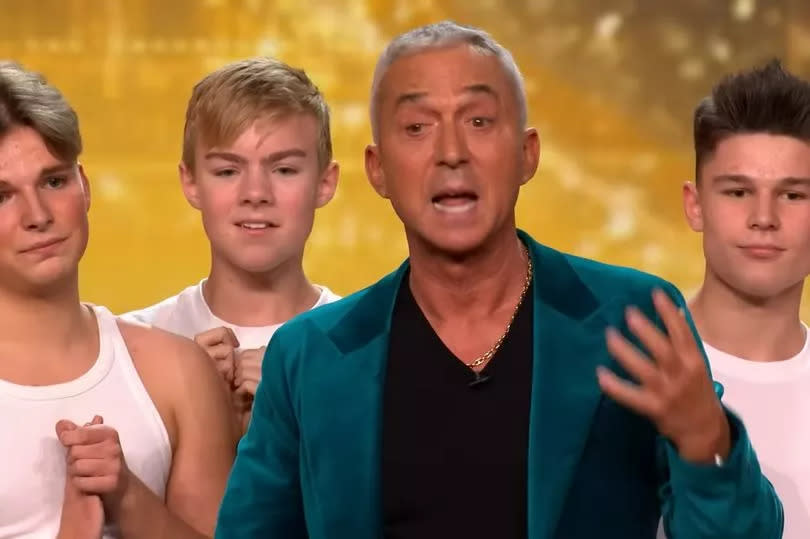 Screenshot of Bruno Tonioli with some of the Phoenix Boys including Charlie