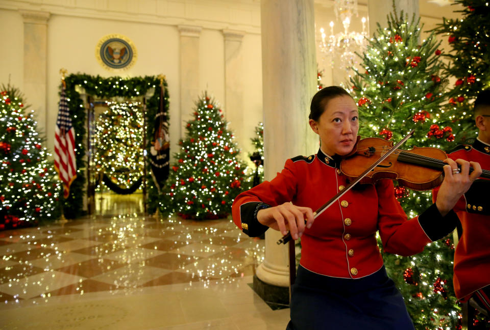 A member of the President’s Own Marine Band plays during the 2018 Christmas Press Preview at the White House in Washington, D.C., Nov. 26, 2018. (Photo: Leah Millis/Reuters)