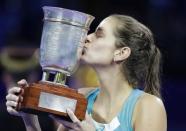 Tennis - Kremlin Cup - Women's singles - Final - Moscow, Russia - October 21, 2017 Julia Goerges of Germany kisses her trophy after defeating Daria Kasatkina of Russia. REUTERS/Tatyana Makeyeva