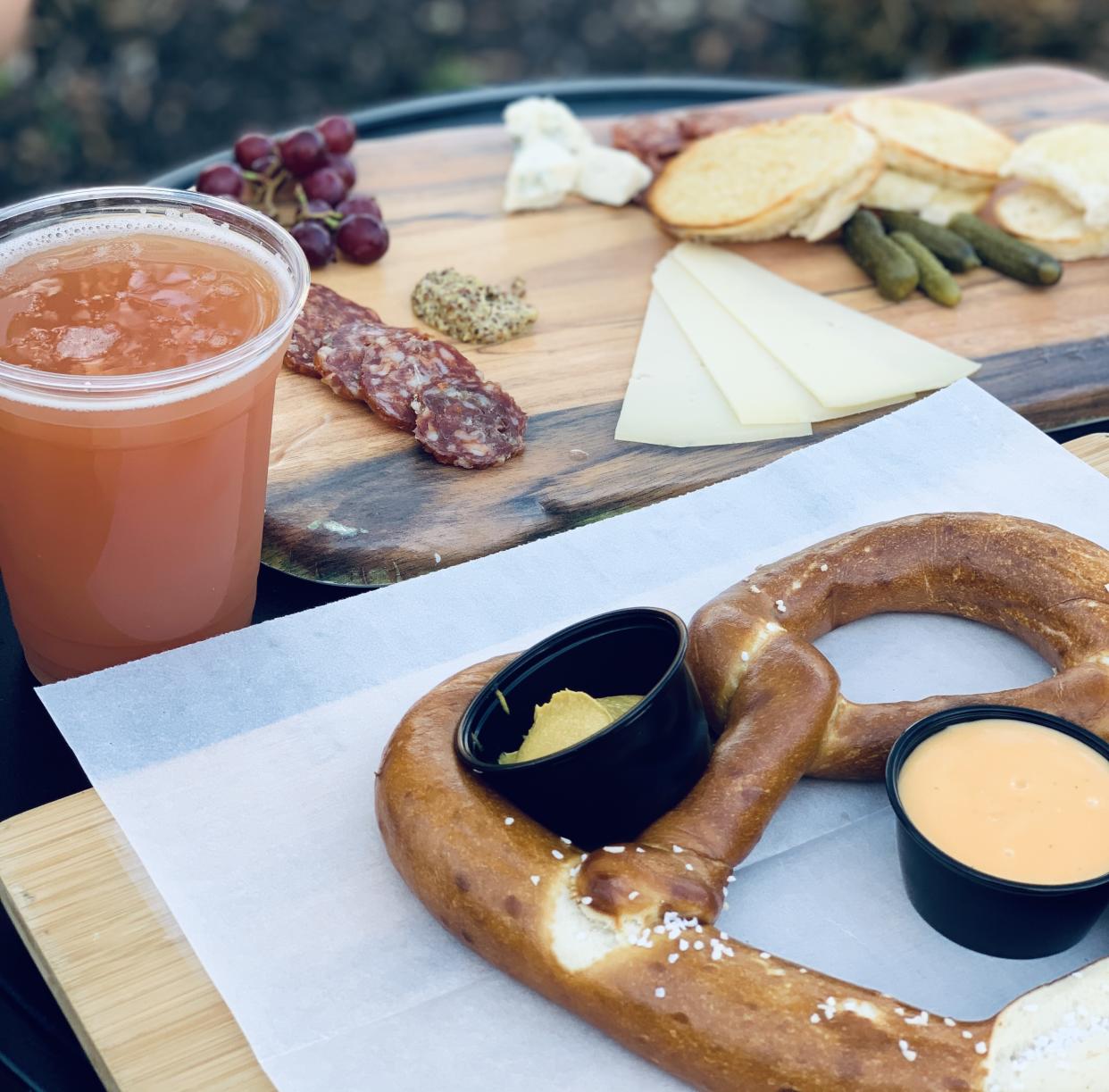 At BaseLine Tap House, beers hailing from the West Coast are served, as well as a delicious charcuterie board. (Photo: Carly Caramanna)
