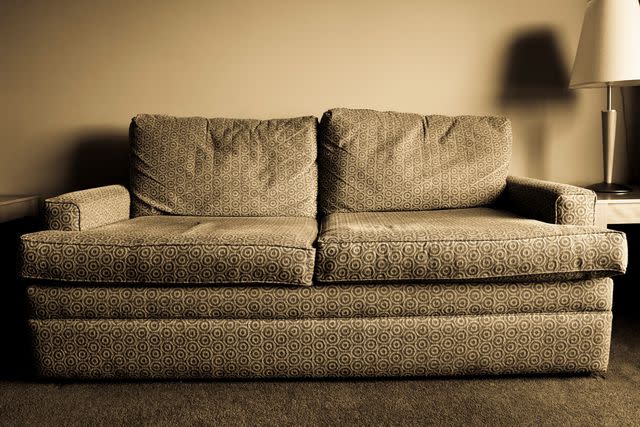 <p>Getty</p> Stock image of an empty couch