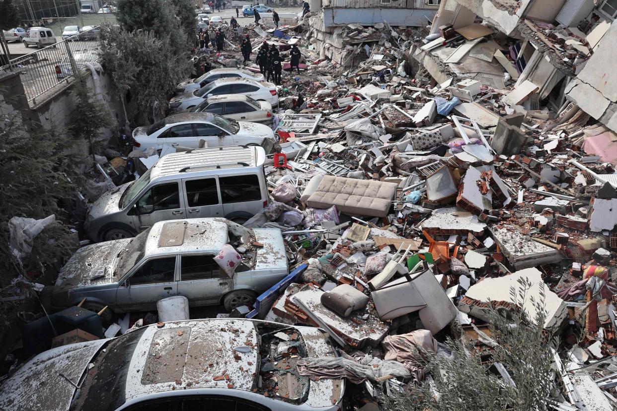 Vehicles are crushed under the rubble of collapsed buildings in Kahramanmaras (AFP/Getty)