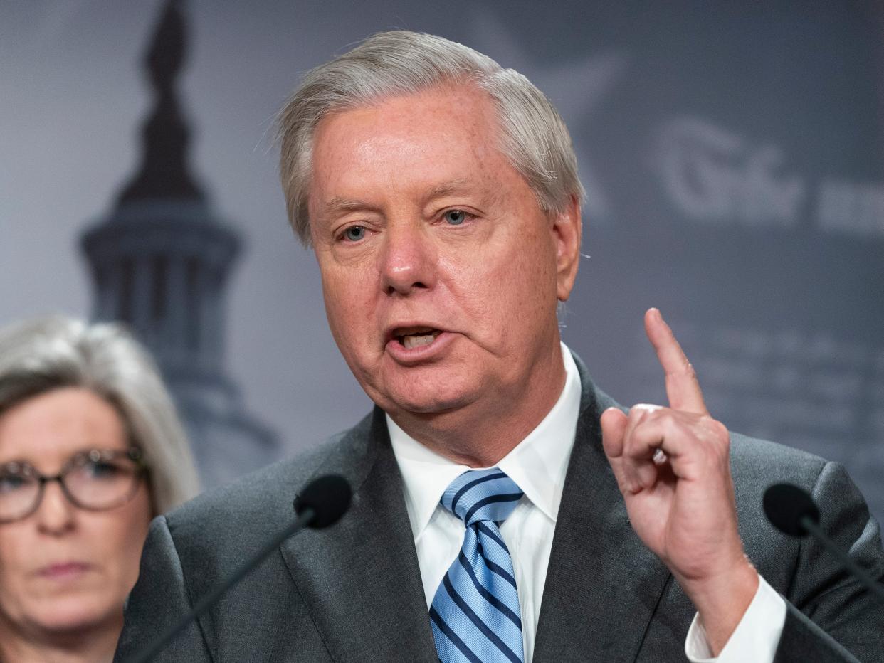 Sen. Lindsey Graham, R-S.C., speaks with reporters about aid to Ukraine, on Capitol Hill, Wednesday, March 10, 2022, in Washington.