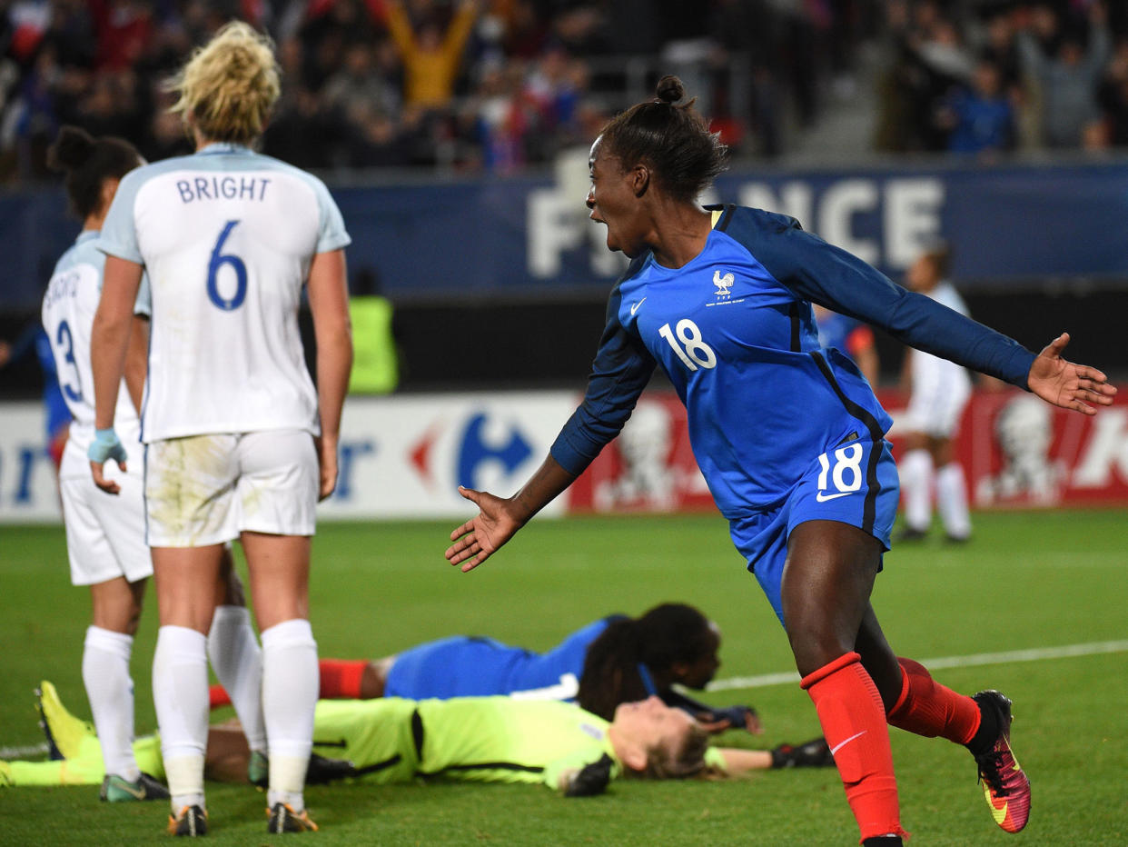 France's Viviane Asseyi celebrates after scoring during the friendly football match between France and England at the Hainaut Stadium in Valenciennes on 20 October: AFP/Getty Images
