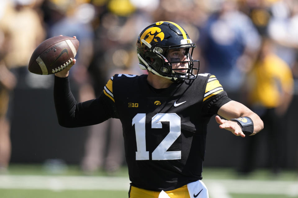 Iowa quarterback Cade McNamara throws a pass during the second half of an NCAA college football game against Utah State, Saturday, Sept. 2, 2023, in Iowa City, Iowa. Iowa won 24-14. (AP Photo/Charlie Neibergall)