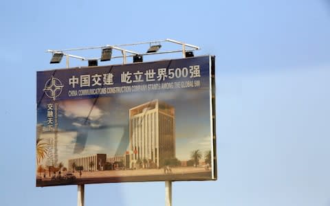 A billboard promoting Chinese investment in Djibouti - Credit: Susan Schulman